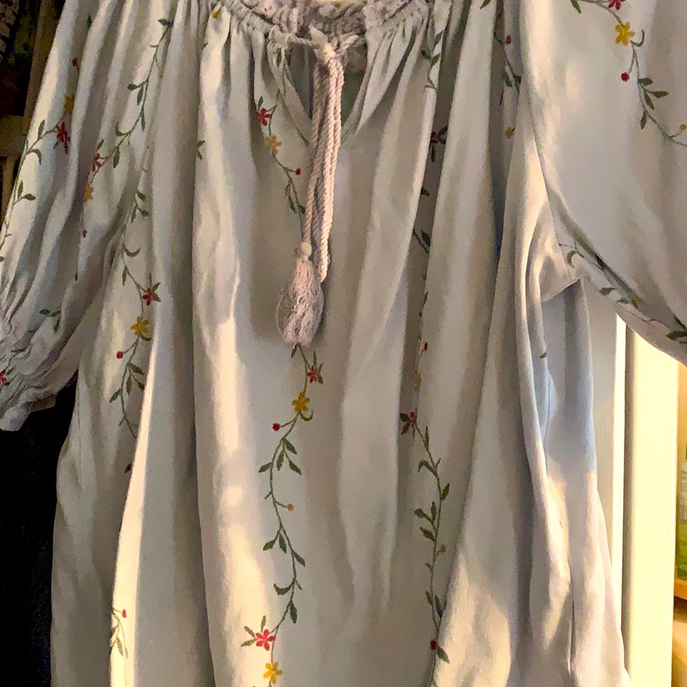 Light grey/ blue shirt with flowers